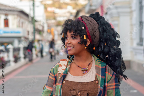 Tourist walking in quito, ecuador, exploring colonial architecture