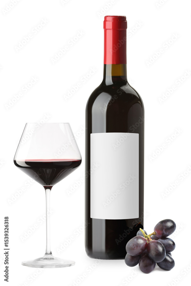 Obraz premium Luxurious red wine in bottle with blank label, glass and grapes isolated on white