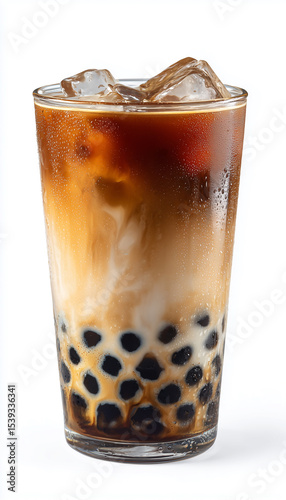 Iced bubble tea with milk and coffee in a transparent glass