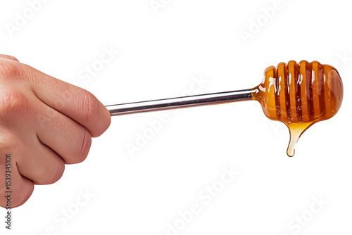 Hand Holding Honey Dipper with Sweet Honey Dripping