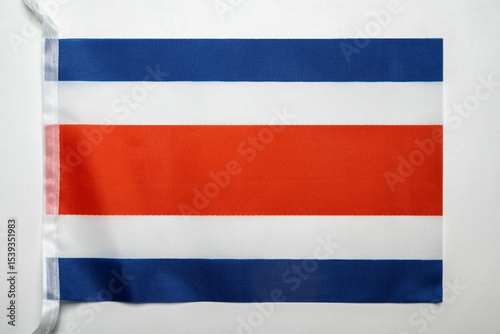 Closeup view of the Costa Rica national flag isolated over a white background. Concept of government and nationality