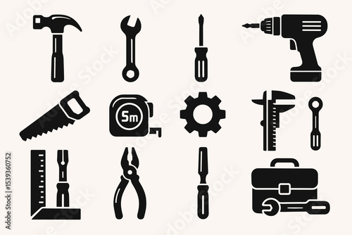 Collection of essential hand and power tools in black silhouettes
