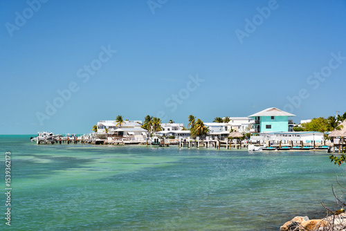 Obraz na plátně Oceanfront homes with docks along the coastline in the Florida Keys, Monroe County, Florida