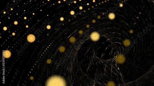 Swirling golden particles forming abstract vortex on dark background with glowing energy motion