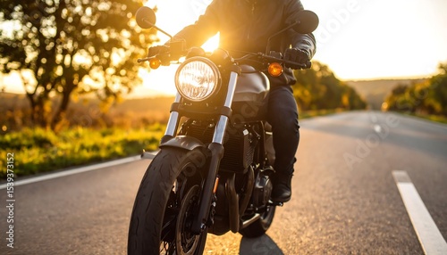 Motorcyclist Sunset Road Trip.