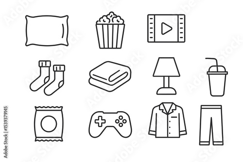 Cozy movie night essentials: popcorn, controller, pajamas, snacks, and more