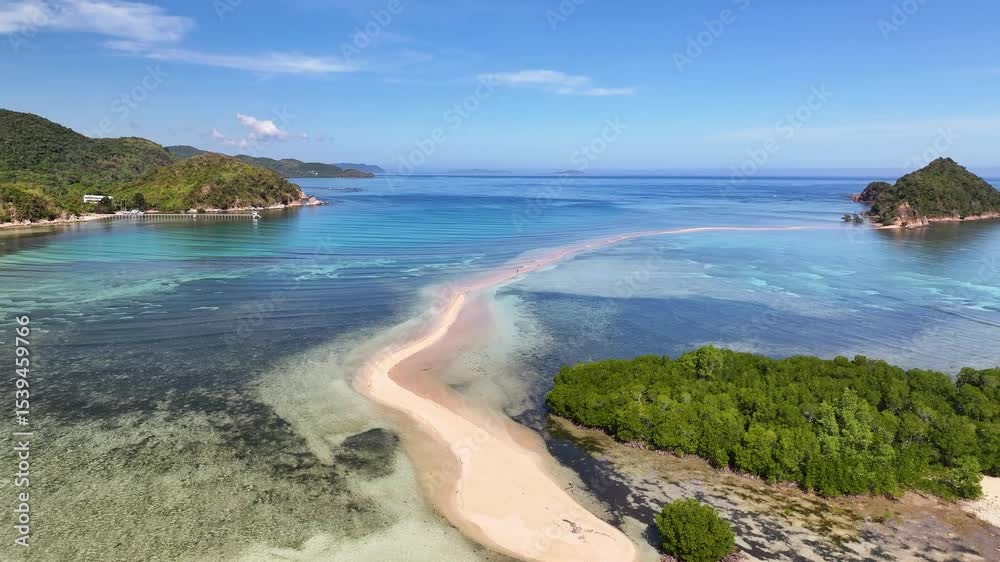Man in the middle of Lakdayan Sand Bar, travel journey, exploring adventure. Philippines, drone