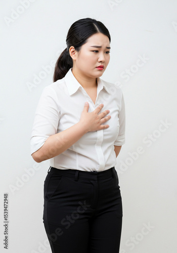 A curvy woman felt pain in her chest, an expression of pain.