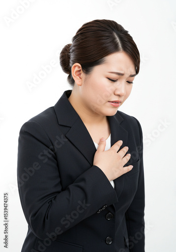 A curvy woman felt pain in her chest, an expression of pain.
