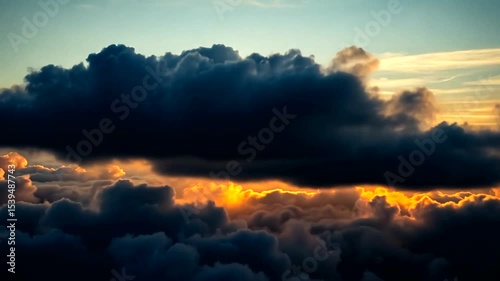 Sunlit Clouds Ascending into the Atmospheric Canvas: A Mesmerizing Sky View