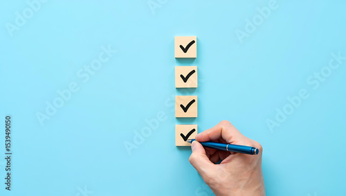 Hand Marking Checkmarks on Wooden Blocks: Representing Task Completion, Goal Achievement, Productivity, and Successful Project Management in Business and Personal Contexts