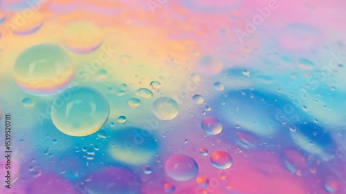Pastel Abstract Macro Image Features Water Droplets On A Vibrant Multicolored Fluid Surface