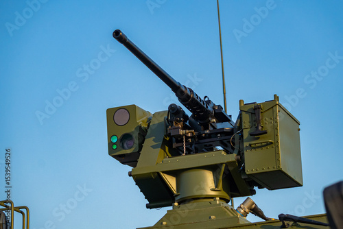 Machine gun mounted on an armored vehicle photo