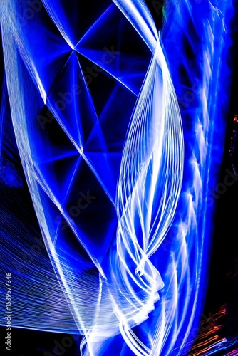 Dynamic interplay of blue and white light trails.