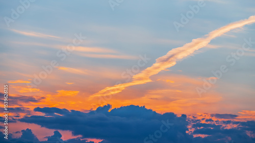 Sunset sky with soft clouds as background.