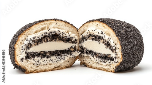 Poppy seed bun with cream cheese filling, halved, showing texture and filling.