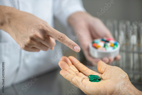 pharmacist explaining medicine dosage to patient