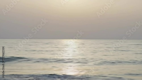 Wallpaper Mural Serene ocean waves at sunset, tranquil beach scene Torontodigital.ca