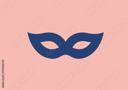 A navy blue symmetrical eye mask floats against a peachcolored backdrop