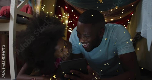 Father tapping tablet, daughter giggling in fort beneath bunk, sparking animated learning story