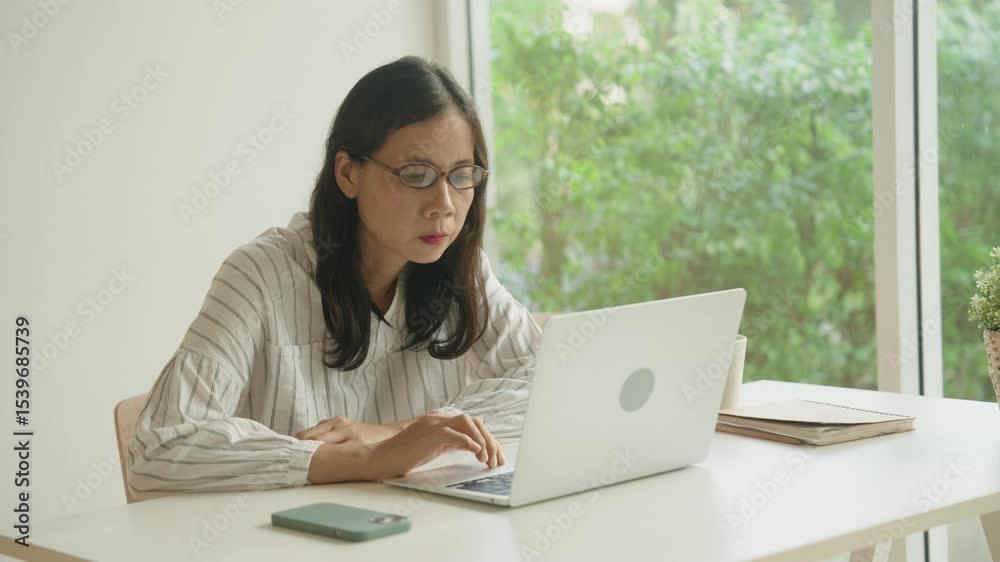 Business woman asian using work on computer workshop at home Business woman asian using work on computer workshop at home