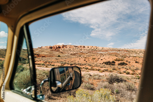 Desert landscape viewed through car window in Arches, Utah