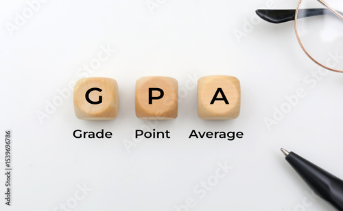 Wooden square with the letters GPA or the word grade point average