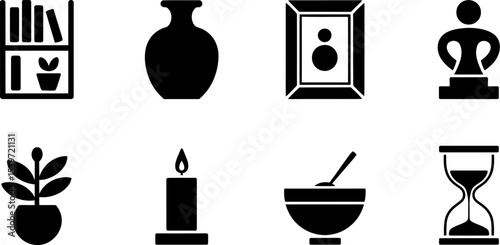 A set of eight black and white icons depicting various household objects and decorative elements neatly arranged