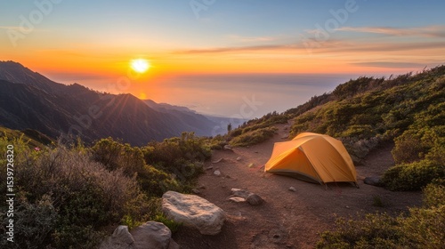Sunset camping on mountain peak