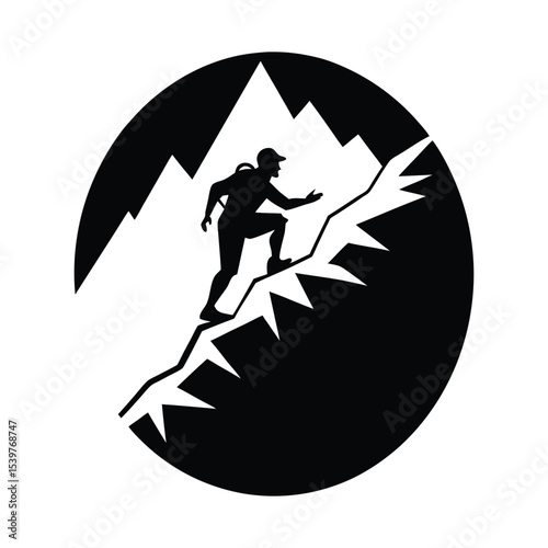 Silhouette of a person climbing snowy ridge