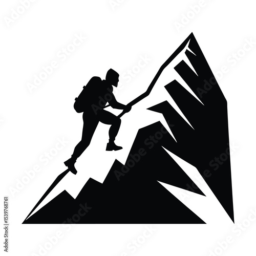 Silhouette of a person climbing snowy ridge