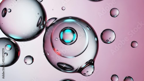 Blue abstract background with water drops on glass surface and circular liquid patterns