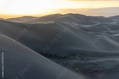 Fototapeta Naklejka Na Ścianę i Meble -  Serene sand dunes at sunrise
