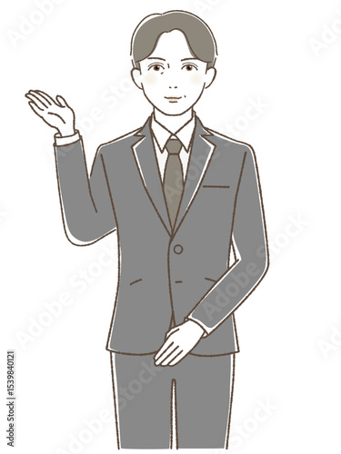 手をあげて微笑むスーツの中高年男性