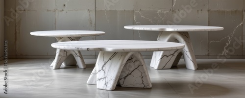 marble desks featuring thin slabs and cantilevered bases, blending lightweight appearance with robust stone material.