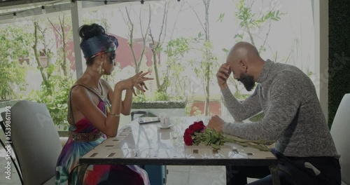 Video showing concept of marriage breakup on a date in a restaurant