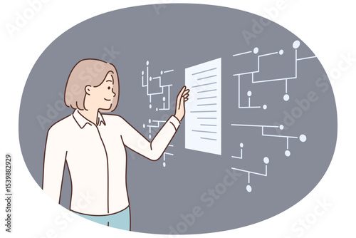 Successful businesswoman standing near digital touch screen looking at electronic documents