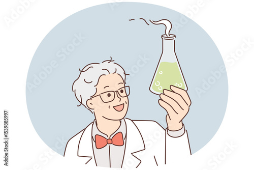 Laboratory assistant holds flask with green fuming liquid while examining chemical reaction