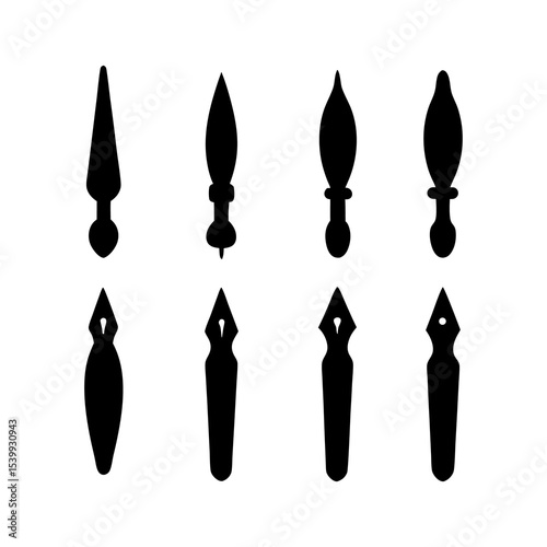 A collection of eight black ink pen nibs arranged in two rows on a white background