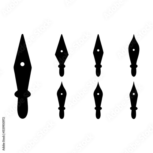 A collection of seven black arrowheads with varying shapes and sizes on white background