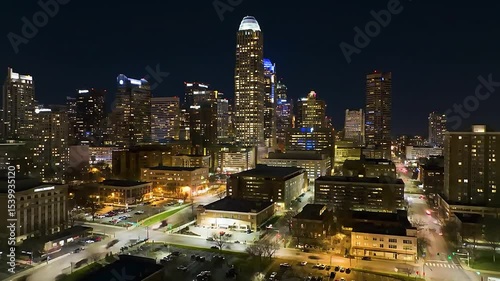 Nighttime footage of city skyline with building lights