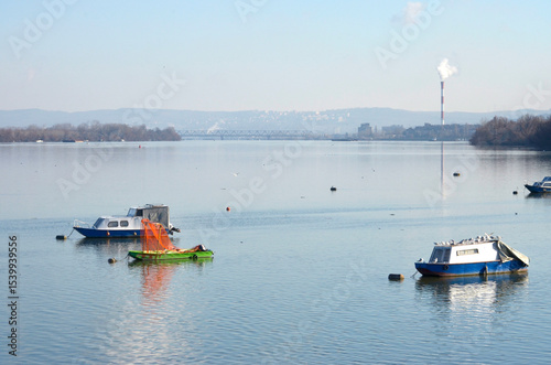 boats anchored on the river
