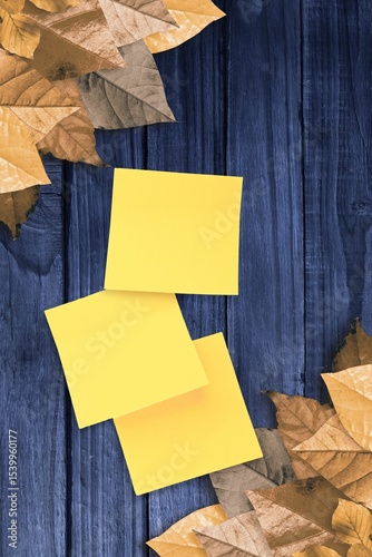 Autumn leaves with yellow note