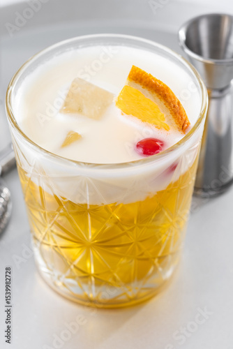 Classic cocktail whiskey sour on white marble background