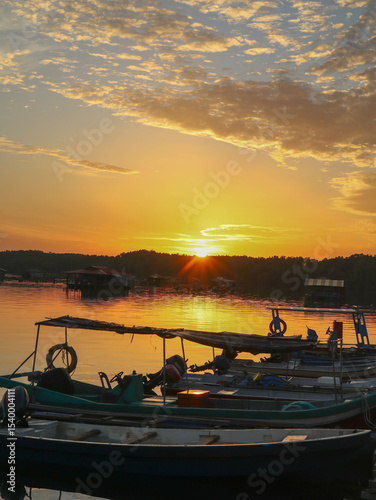sunrise over the river at traditional fishing village