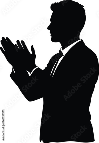 Silhouette of a business man in a suit, clapping his hands