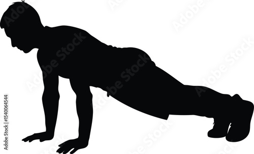 Silhouette of a man doing a push up exercise with great effort