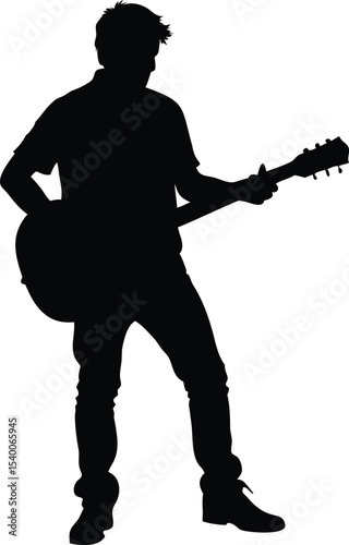 Silhouette of a musician playing the acoustic guitar with relaxed pose