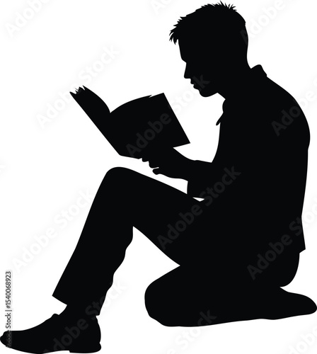 Silhouette of Man Sitting and Reading a Book with Deep Concentration