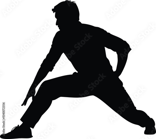 Silhouette of a man stretching in a dynamic yoga pose or dance